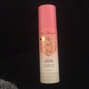 Two faced setting spray